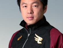 Portrait of a young man in athletic jacket.